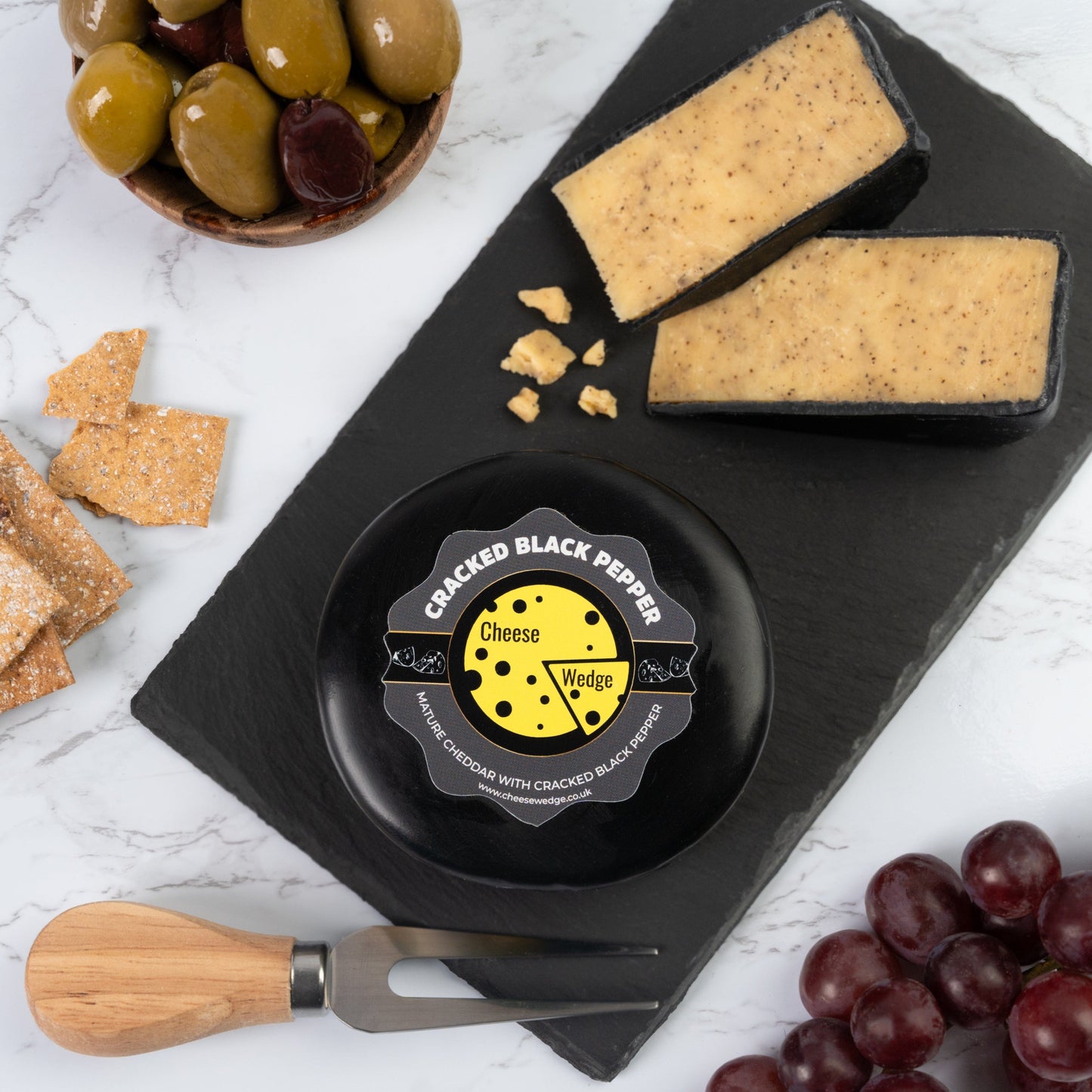 The Cheese Wedge Company Truckles Cracked Black Pepper - Waxed Truckle 200g